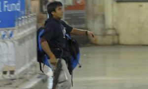 Mohammad Ajmal Kasab during his armed rampage at a train station as part of the Mumbai attacks